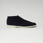 FBYMM Loro Piana Openwalk loafer in navy knitted virgin wool met een witte rubberen zool en verborgen elastiek.