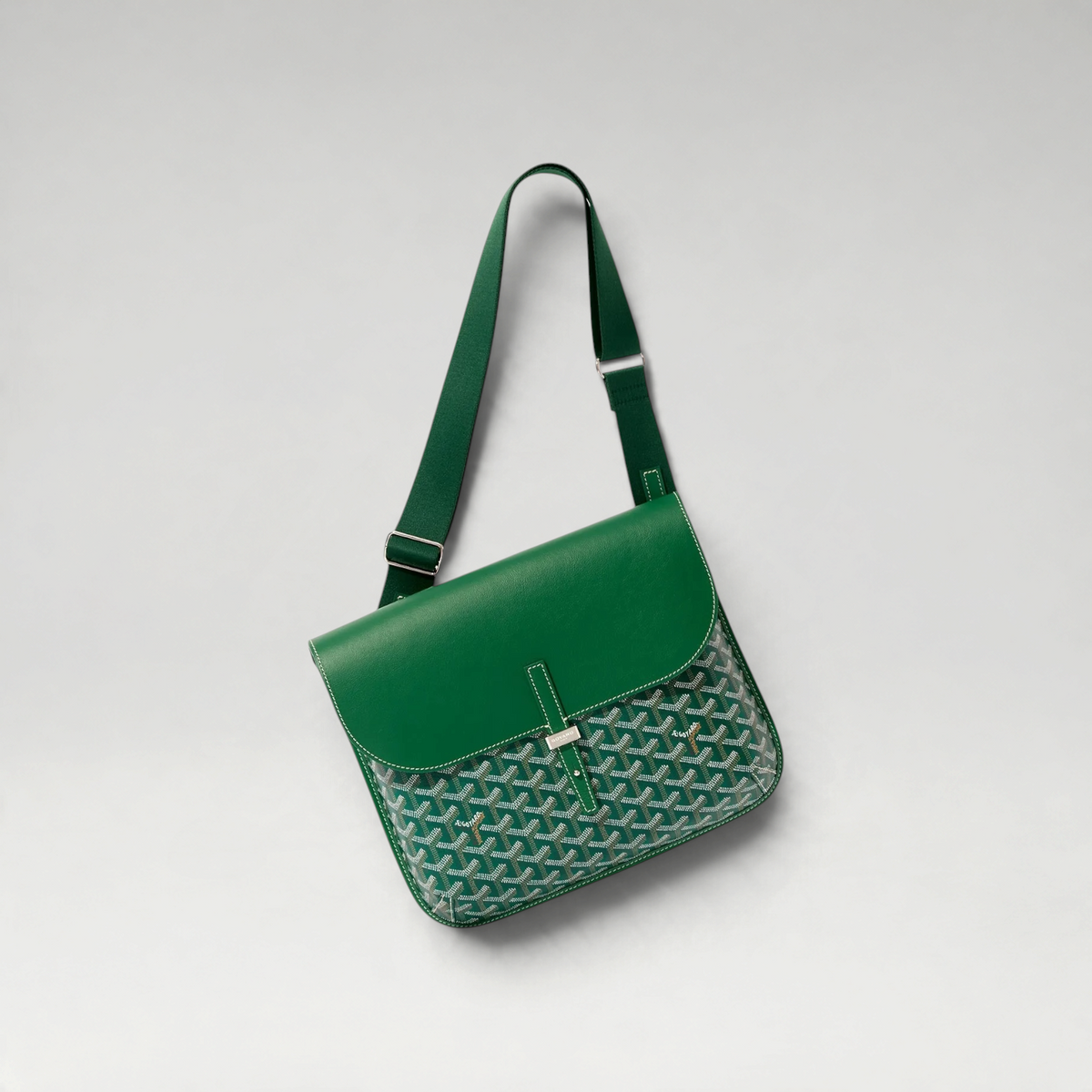 FBYMM Coursier messenger tas in groen leer met verstelbare schouderband en iconisch patroon