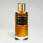 FBYMM Eternal Wood parfum in een glazen fles met gouden dop en zwart etiket, geur met houtachtige en oosterse noten.